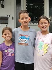 Austin, Savannah and Lily standing together