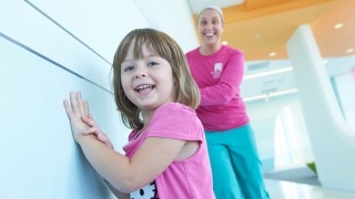Girl smiling with Medical Professional