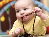 baby with beads