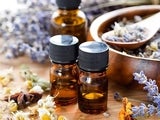 Aromatherapy oil bottles and flowers