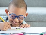 Young boy drawing a picture