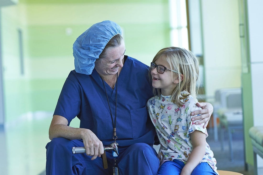 Doctor and patient smiling together