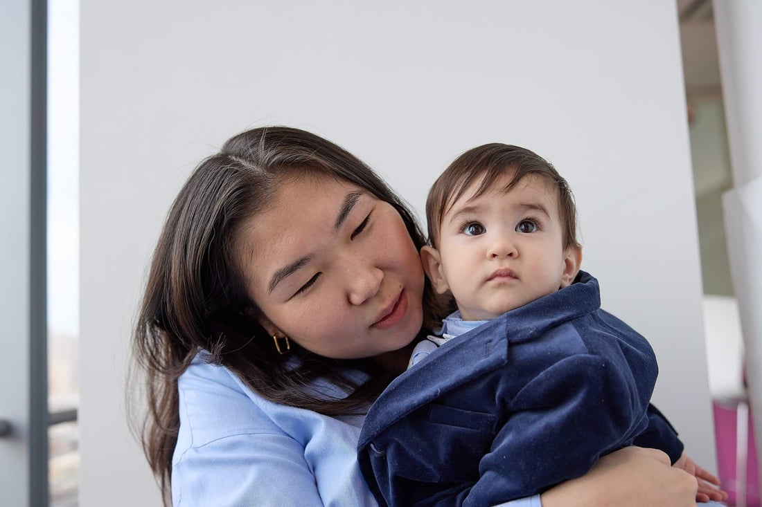 Mother holding her son