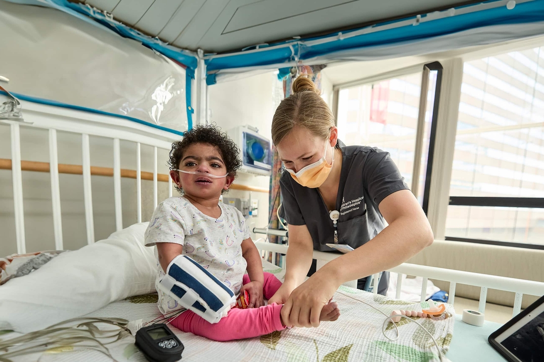 Nurse administering care to inpatient