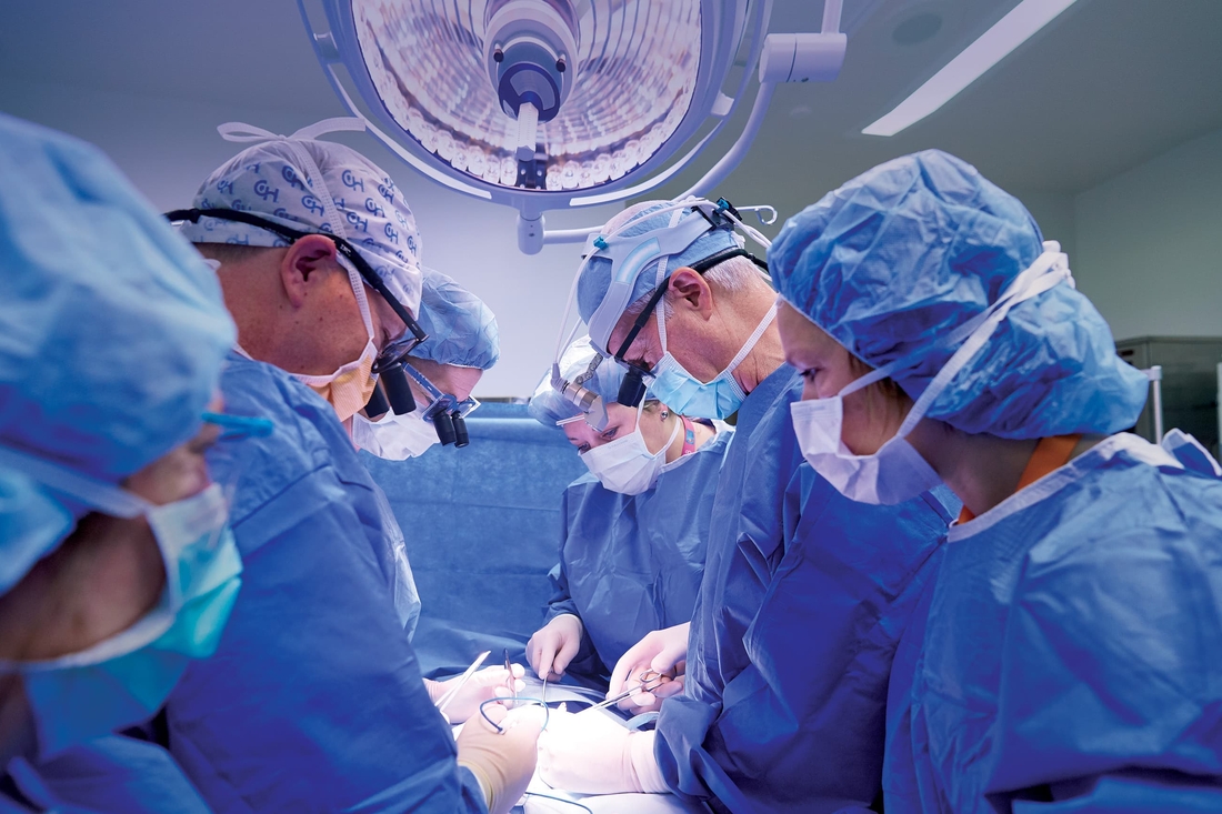 Many surgeons heads down with one important job to do