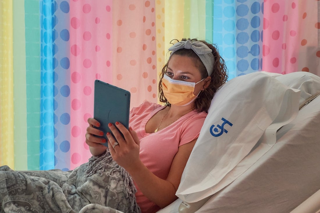 Mom cozy in her Special Delivery Unit patient room