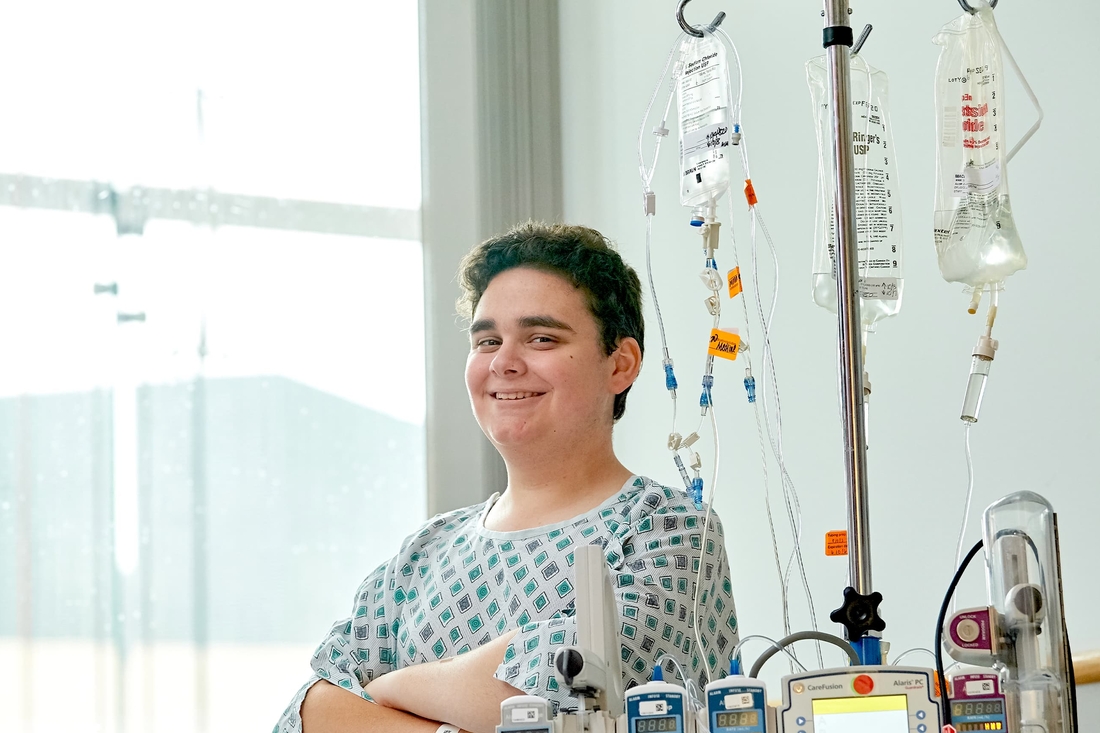 Infectious disease patient in hospital room smiling