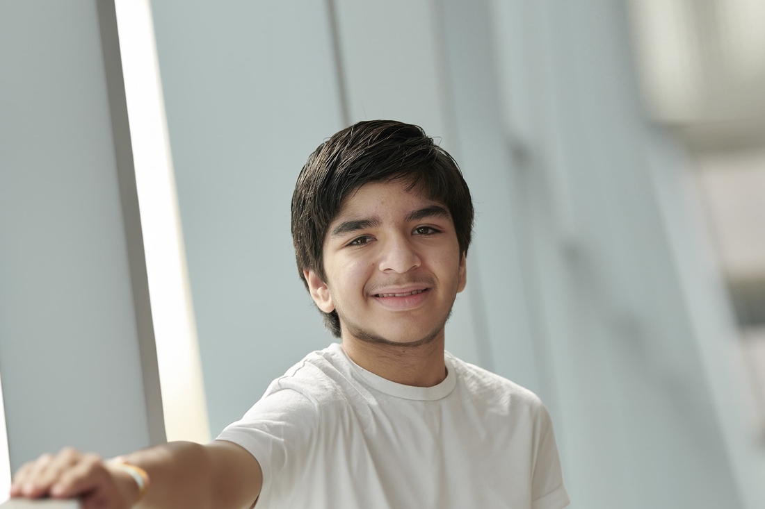 Young teen boy smiling