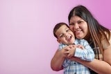 Mother and son smiling