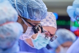 Close-up of surgical team with scrubs and masks on