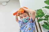 Patient playing with stuffed animal