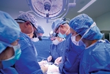 Many surgeons heads down with one important job to do