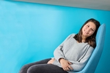 Teenage girl relaxing in chair