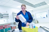 Pharmacy staff reviewing an order