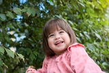 Girl in pink top smiling