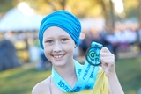 Parkway ambassador holding her medal