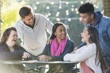 Group of teens talking and laughing 