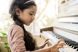 Girl playing piano