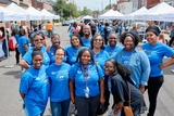 Community Impact team members at an outside street event.