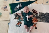 Baby in Eagles gear