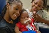 Siblings visit baby brother with complex airway issue