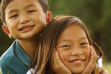 boy hugging girl and smiling