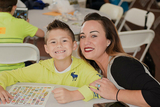 Mother and son smiling