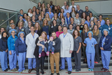 Twins, their parents, and the team at CHOP