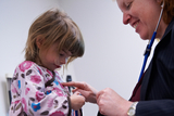 Primary Care visit - young girl with doctor