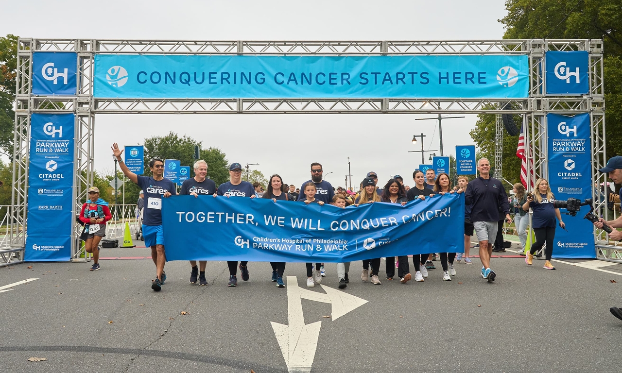 Parkway Run 2024 - team crossing finish line