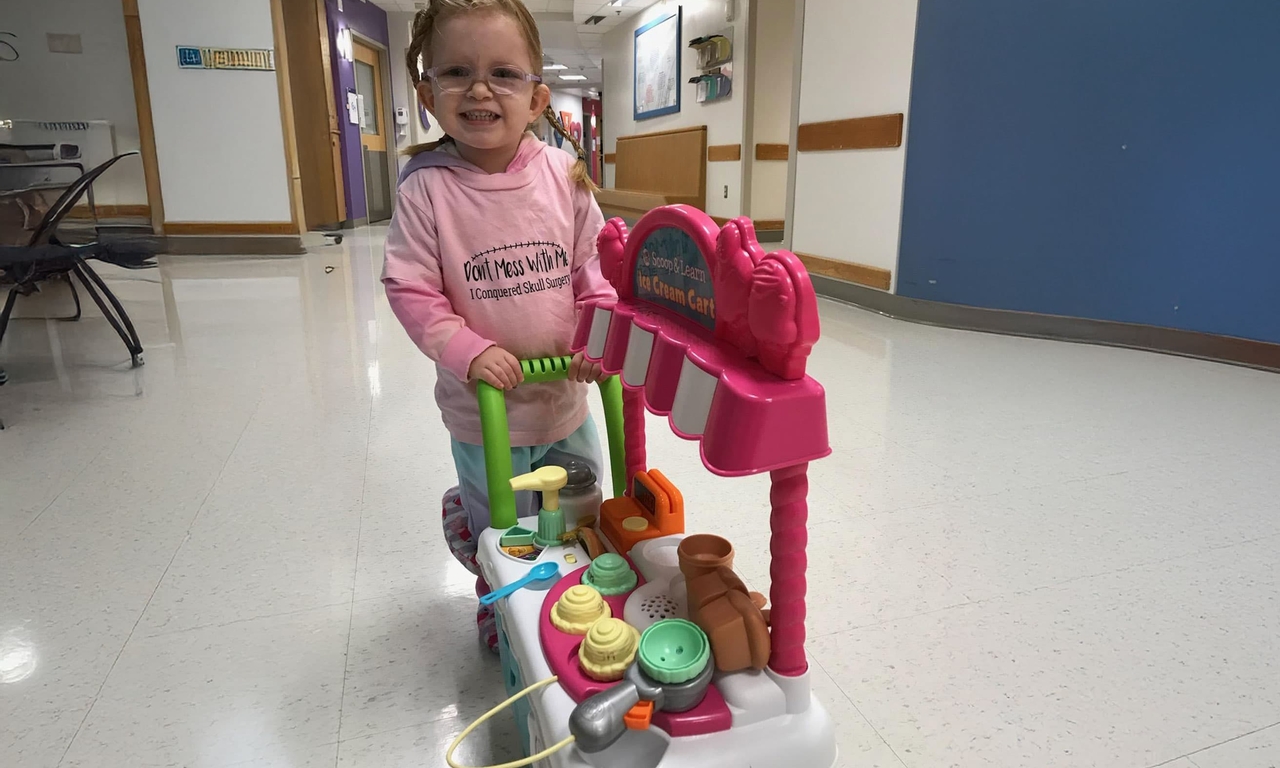 Charlotte with shopping cart in hospital