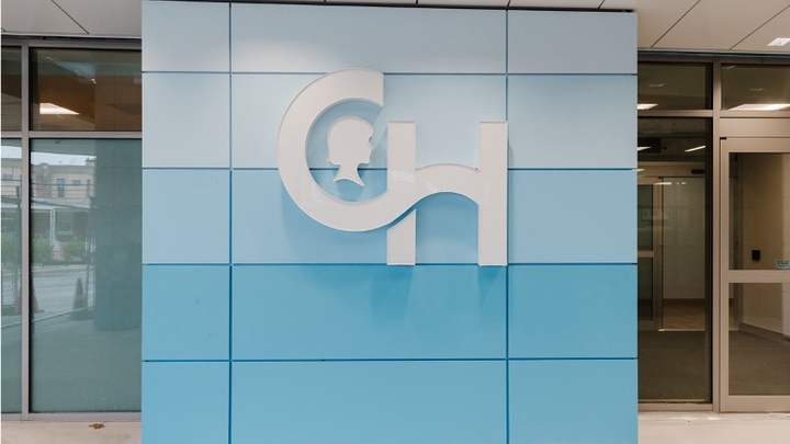 CH logo on blue wall