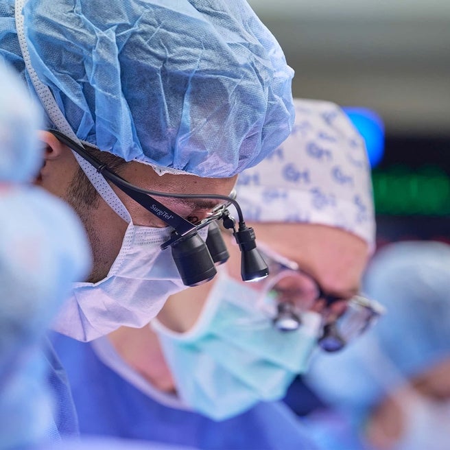 Close-up of surgical team with scrubs and masks on