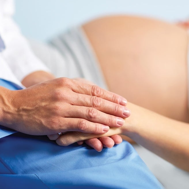 Compassionate moment between patient and staff