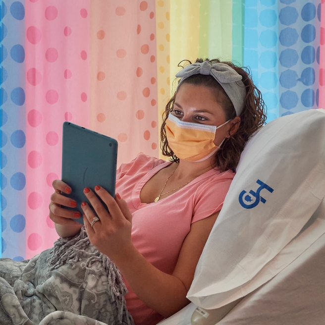 Mom cozy in her Special Delivery Unit patient room