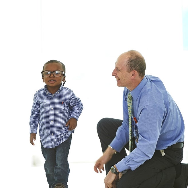 Doctor talking with young patient