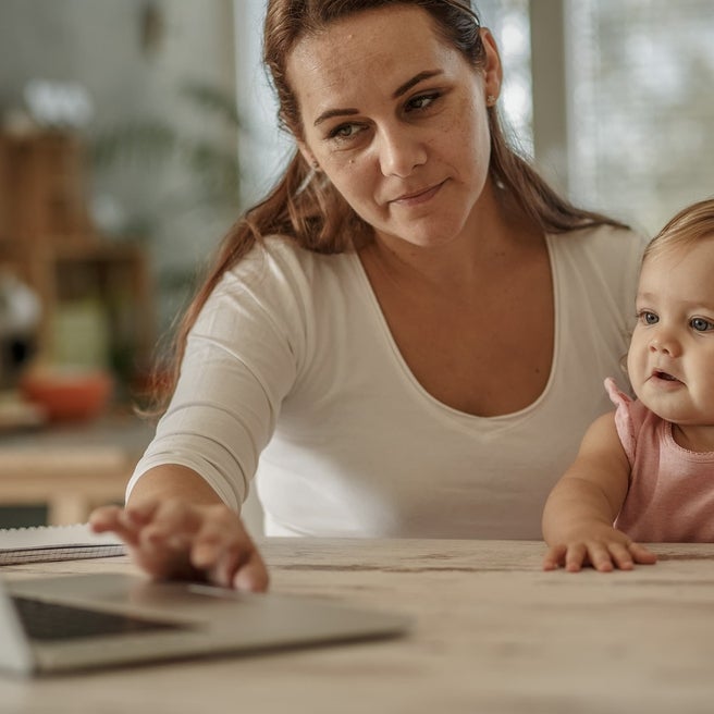 Mom with child on laptop