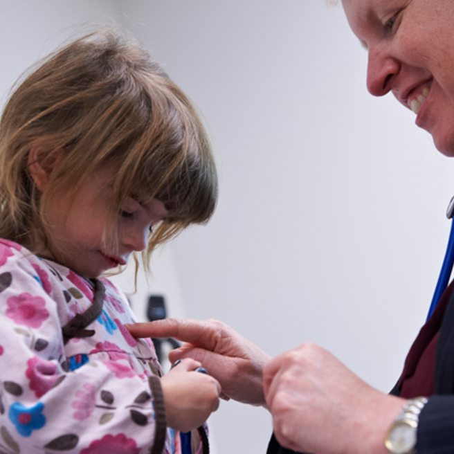 Primary Care visit - young girl with doctor