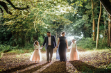 Happy family walking in the nature.