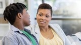 Teen patient talking with provider