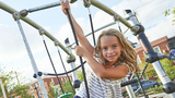 Girl playing on playground