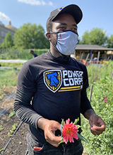 PowerCorpsPHL team member working on an urban farm