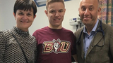 teenage boy with nurse and doctor