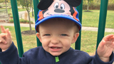 Shane CF patient sitting outside on playground