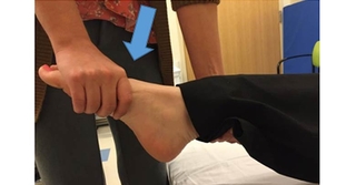 Ankle down stretch (plantarflexion)