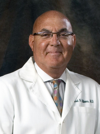 Noel Williams, MD, BCh, MCh, FRSCI, FRCS (Gen)