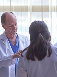 Fetal doctors talking in lab