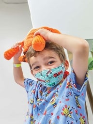 Patient playing with stuffed animal