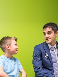 Physician speaking with patient