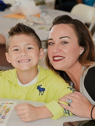 Mother and son smiling